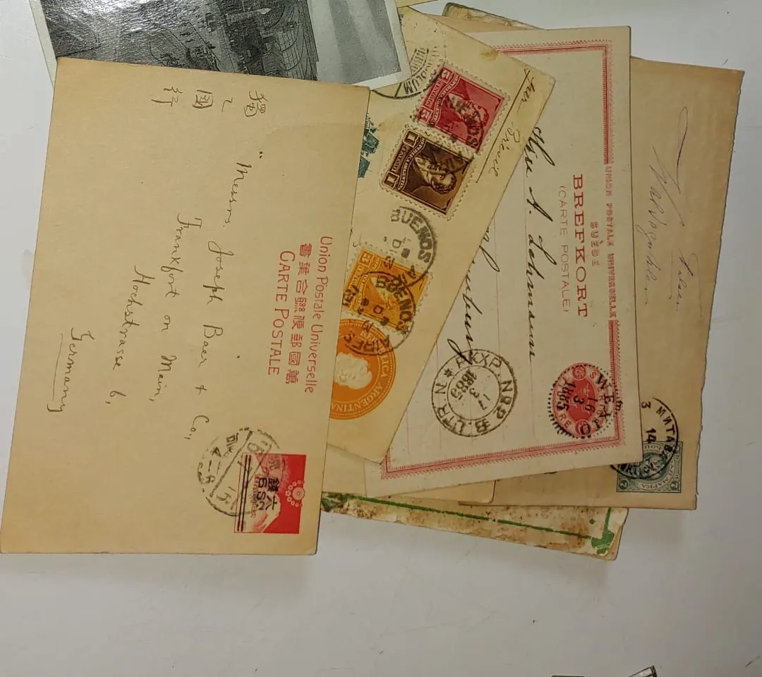 Old postmarked postcards with stamps